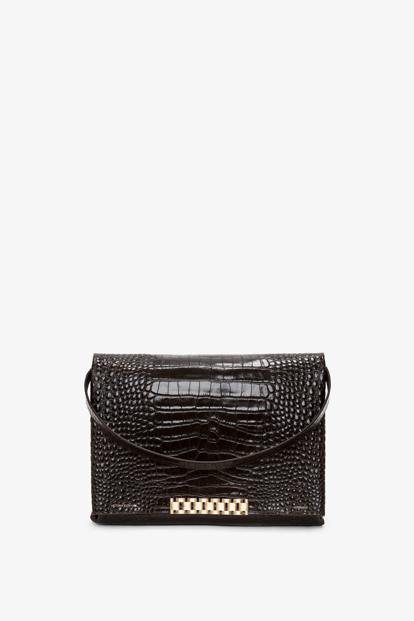A Jumbo Chain Pouch Bag In Chocolate Croc-Effect Leather by Victoria Beckham with a sleek design, featuring a gold decorative clasp and a thin shoulder strap. Perfect for versatile styling, this accessory effortlessly transitions from day to night.