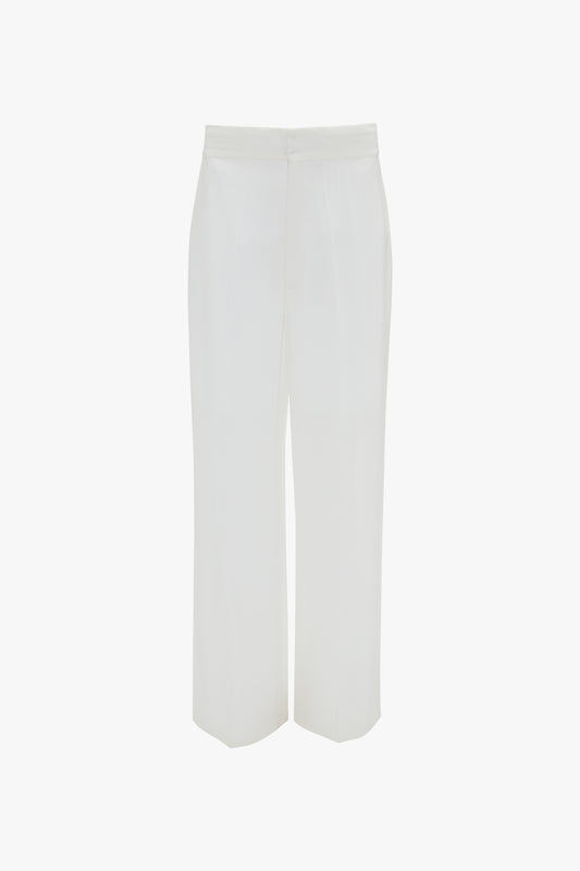 Contemporary cool Victoria Beckham white wide-leg trousers on a plain white background.