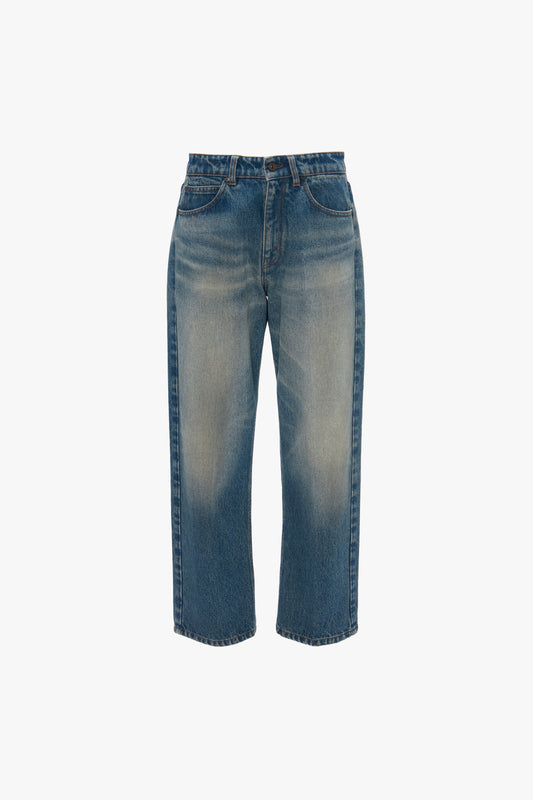 A pair of Victoria Beckham Relaxed Straight Leg Jeans In Antique Indigo Wash with an ankle-length hem, photographed on a white background.