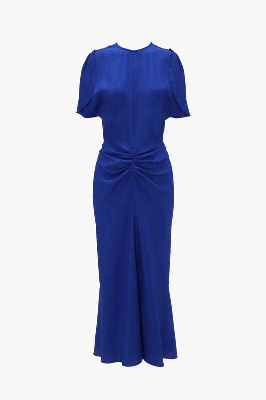 A Victoria Beckham Gathered Waist Midi Dress In Palace Blue with cap sleeves, a cinched waist, and a twisted detail at the front.