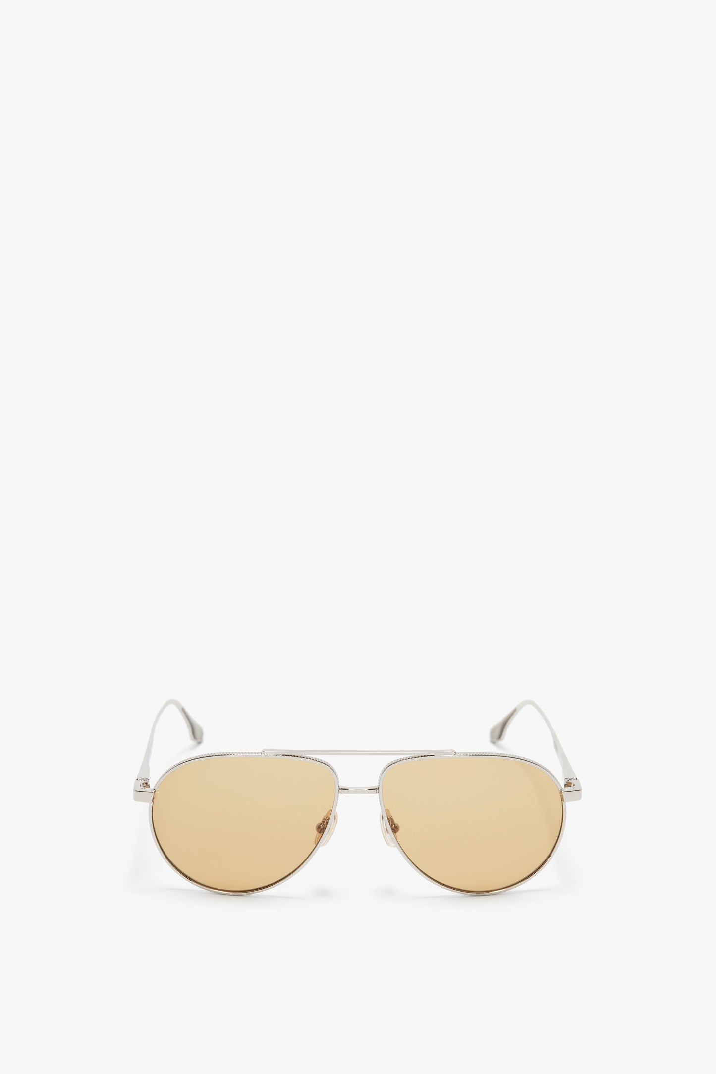 A pair of Victoria Beckham V Metal Pilot Sunglasses In Silver-Brown, positioned on a white background.