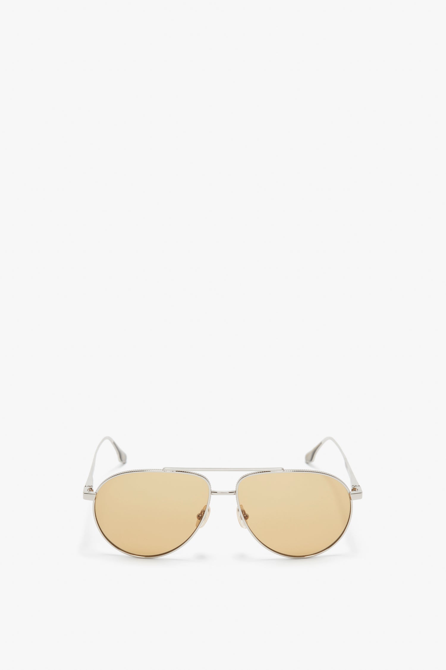 A pair of Victoria Beckham V Metal Pilot Sunglasses In Silver-Brown, positioned on a white background.