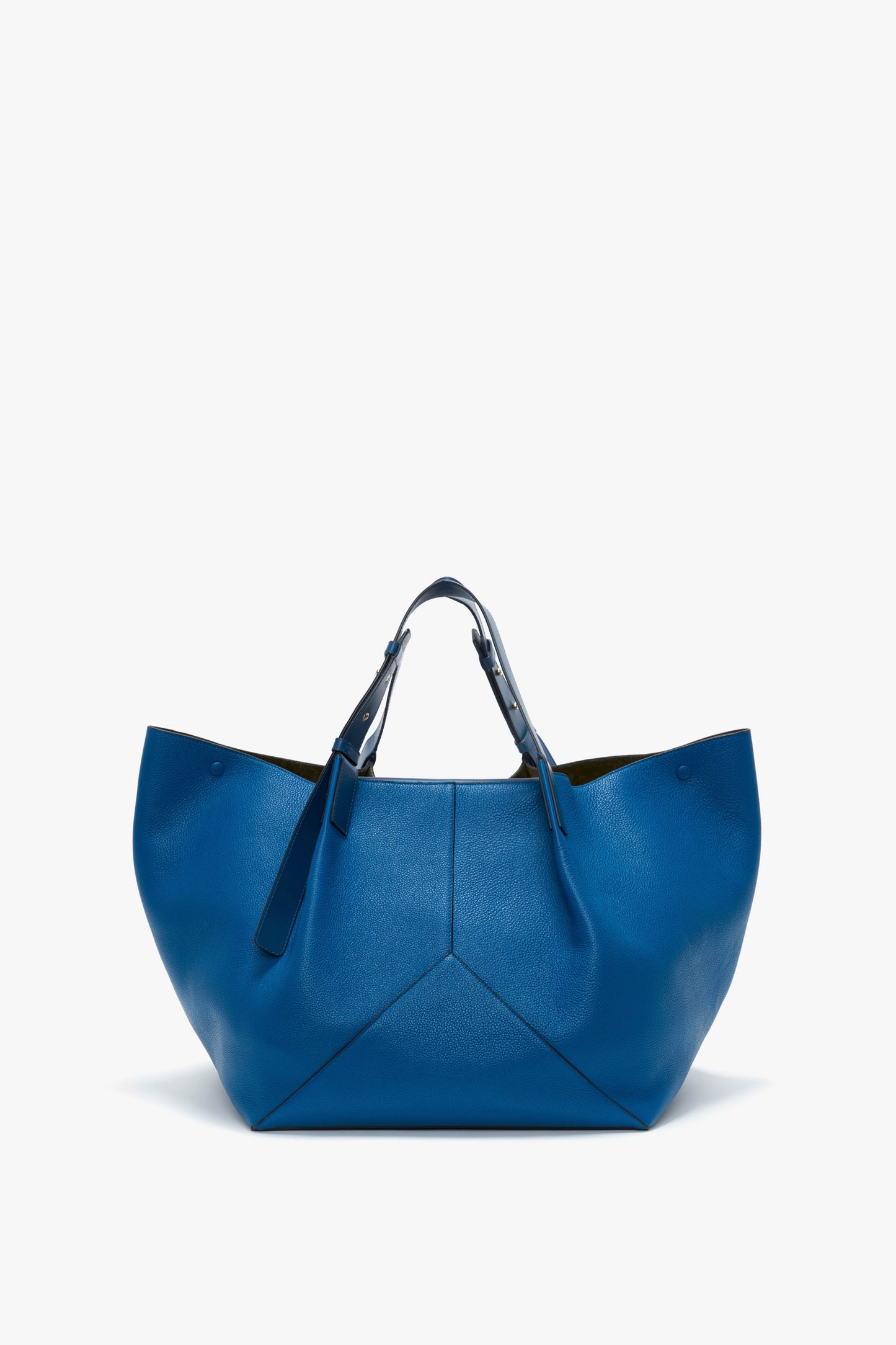 A large, vibrant blue leather tote bag with a structured design, two top handles, and a simple, unadorned exterior has been replaced by the Victoria Beckham W11 Medium Tote Bag In Vibrant Blue Leather.