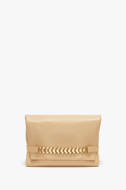 Beige leather Chain Pouch With Strap In Sesame Leather by Victoria Beckham with a gold chain detail on a plain white background.