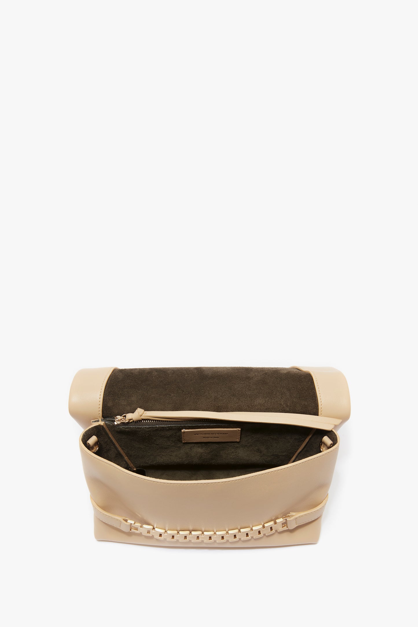 A beige, leather Chain Pouch Bag With Strap In Sesame Leather by Victoria Beckham features an open flap revealing a dark interior and a zippered pocket inside, complemented by a versatile gold chain detail.