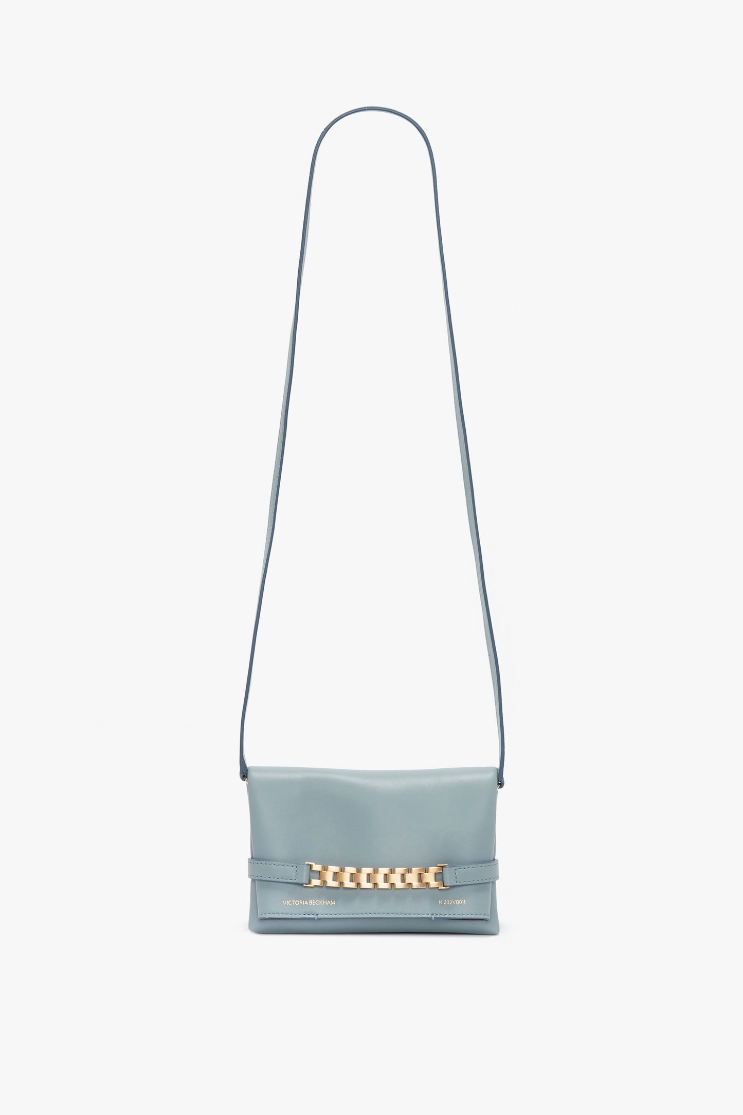 A Victoria Beckham Mini Chain Pouch Bag With Long Strap In Ice Leather.