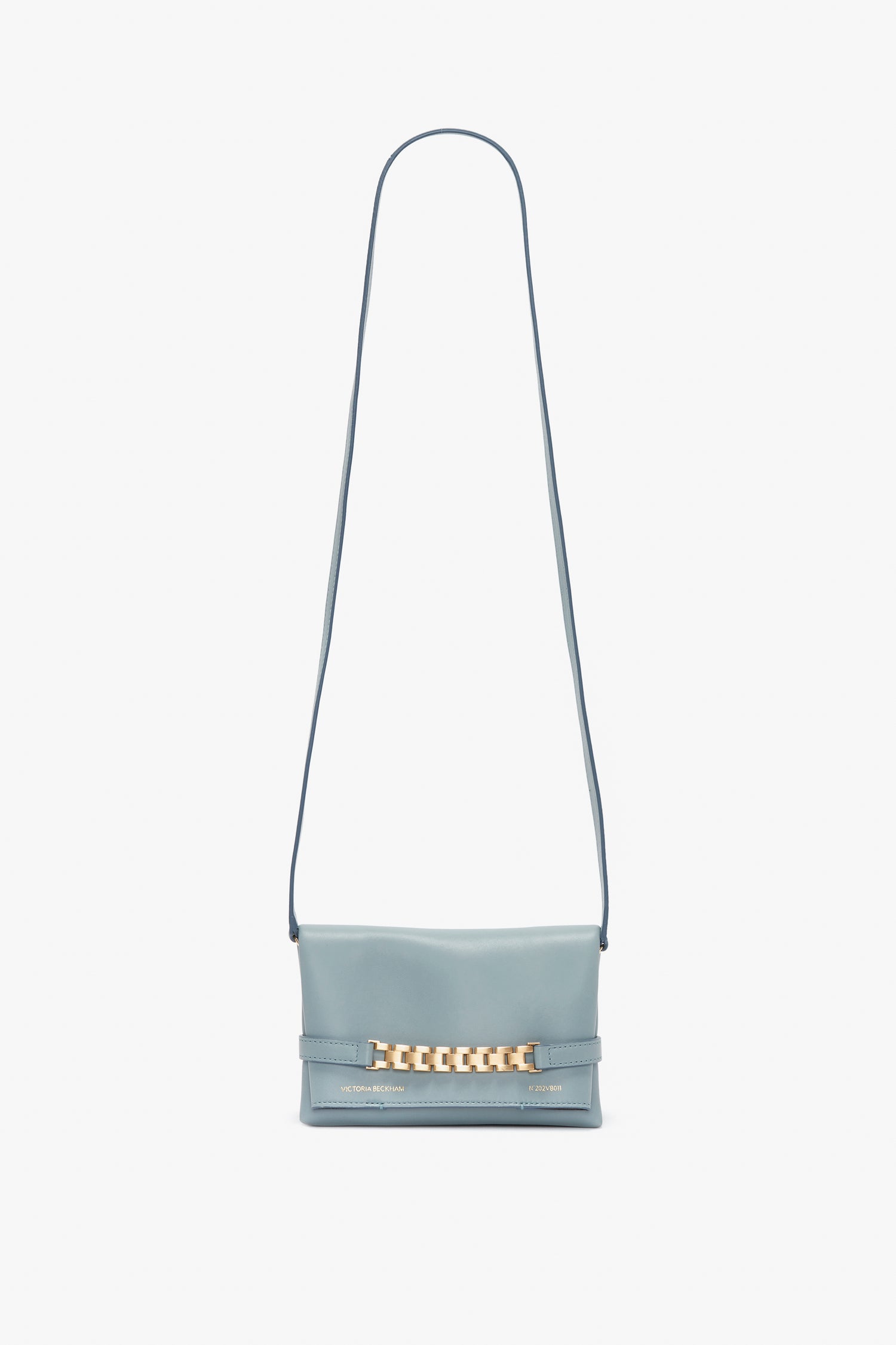 A Victoria Beckham Mini Chain Pouch Bag With Long Strap In Ice Leather.