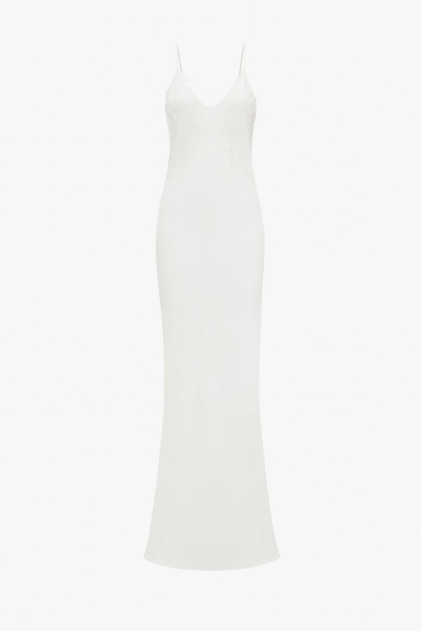 A simple white, sleeveless, slim-fit evening dress with lace detailing on the upper part, displayed against a white background. 
would become:
An Exclusive Lace Detail Floor-Length Cami Dress In Ivory by Victoria Beckham, displayed against a white background.