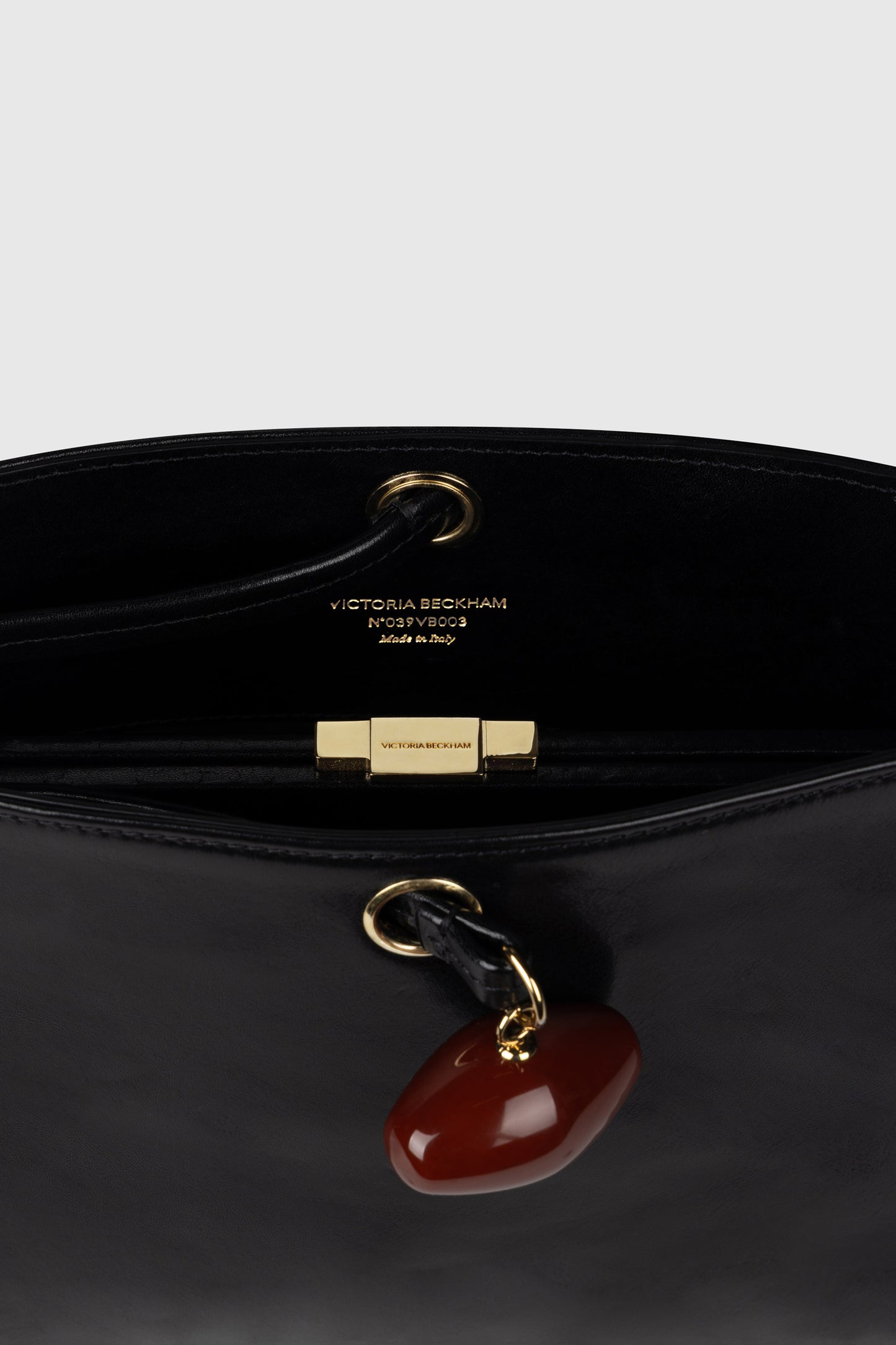 Kizette Clutch Supple Shine Leather