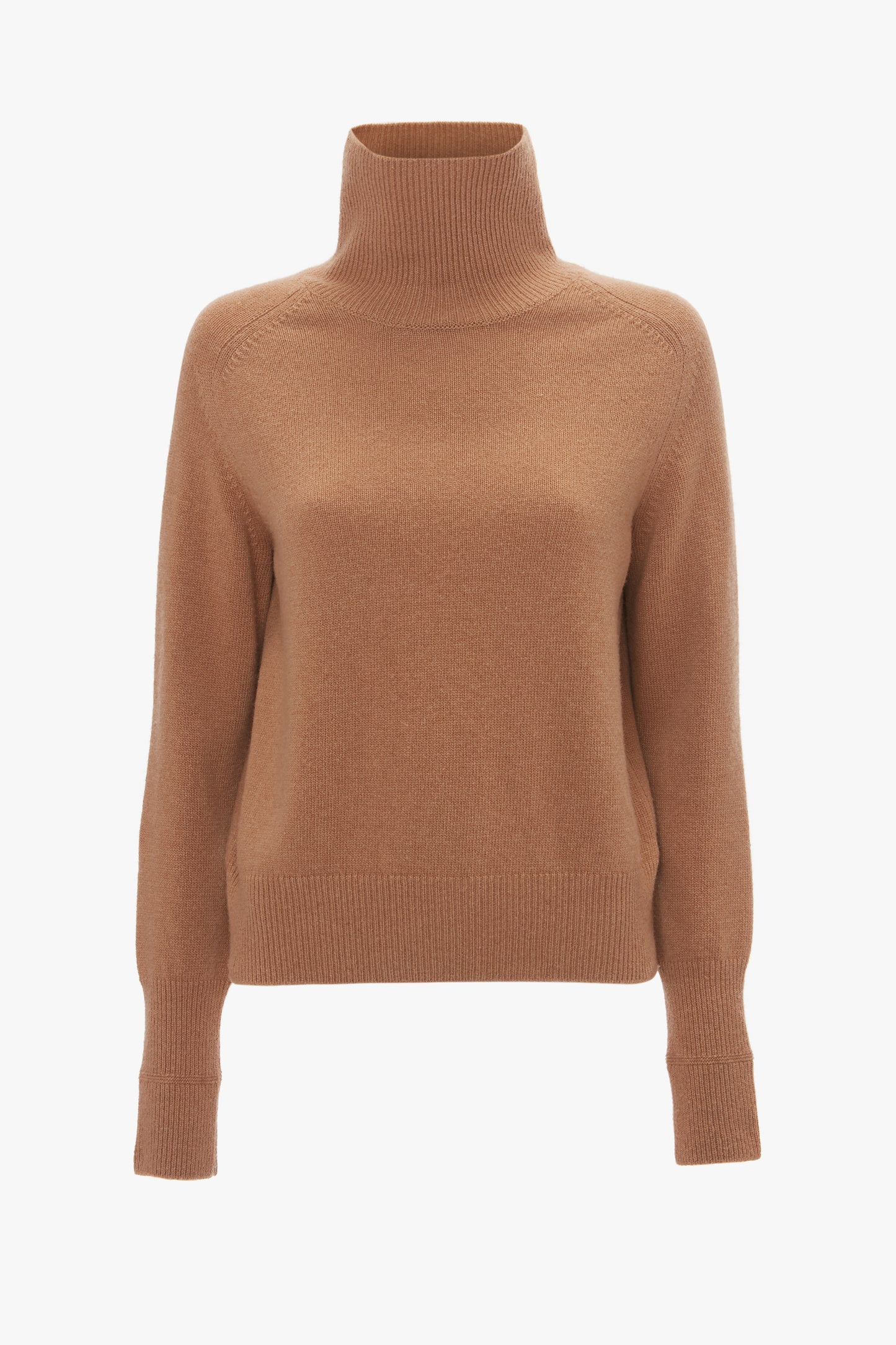 A tobacco-colored lambswool polo neck jumper with long sleeves and ribbed cuffs, isolated on a white background. Brand Name: Victoria Beckham