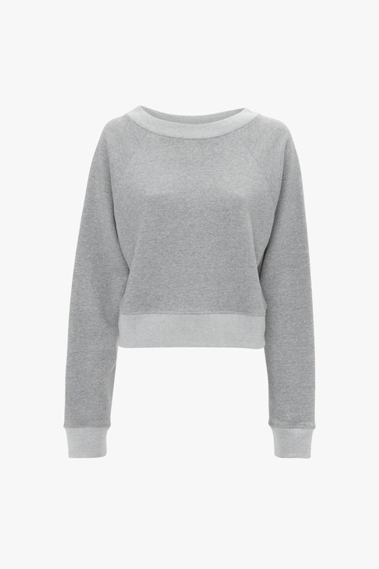 Victoria Beckham Grey Marl Cropped Sweatshirt with long sleeves and a crew neck, displayed on a white background.