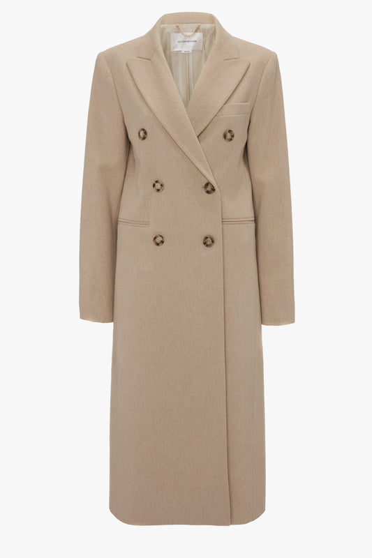 A Victoria Beckham Tailored Slim Coat In Bone with wide lapels and front button closures, displayed against a white background.