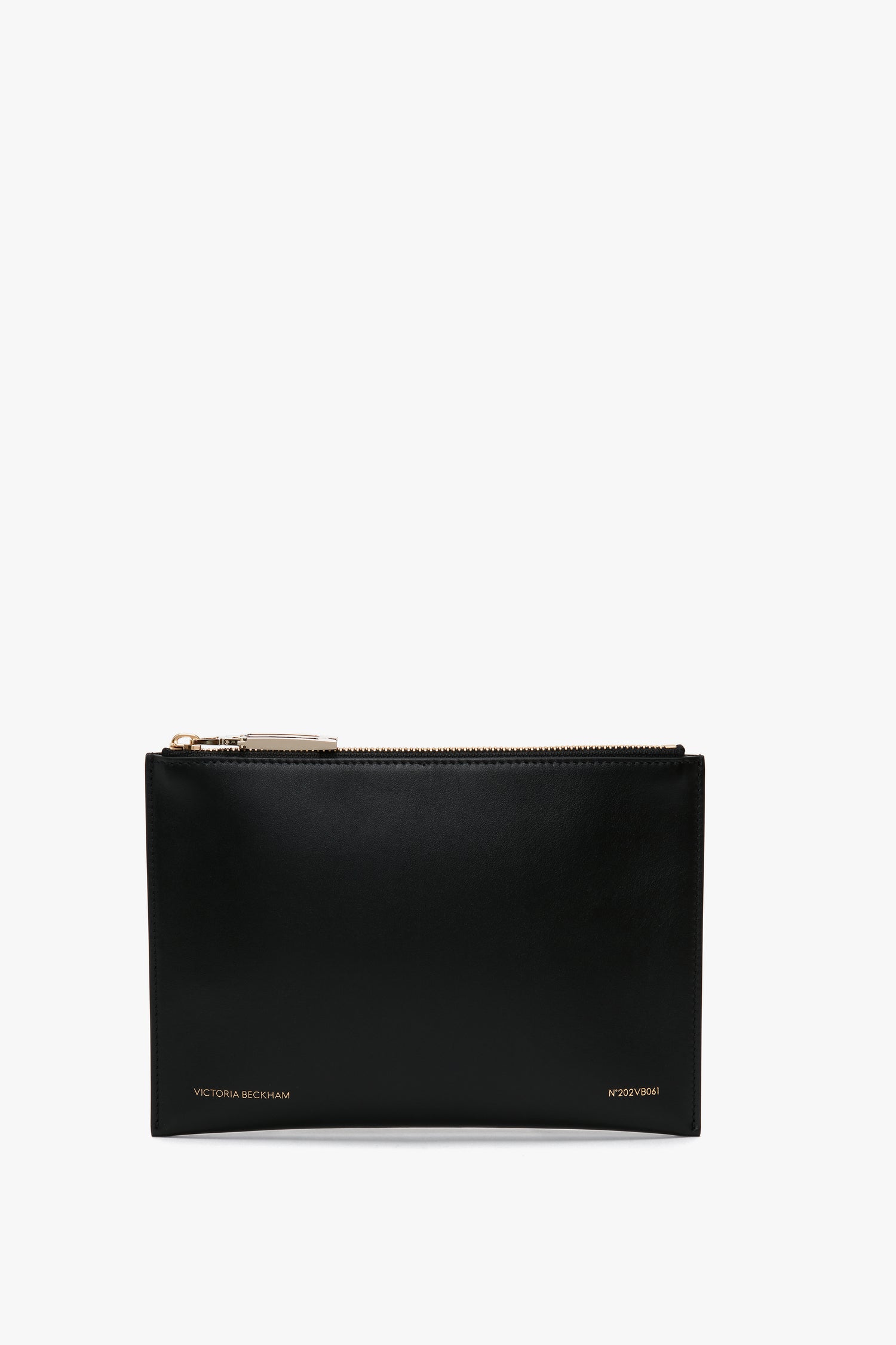 Black calf leather Victoria Beckham B Frame Pochette with a gold-tone zip closure, displayed against a white background.