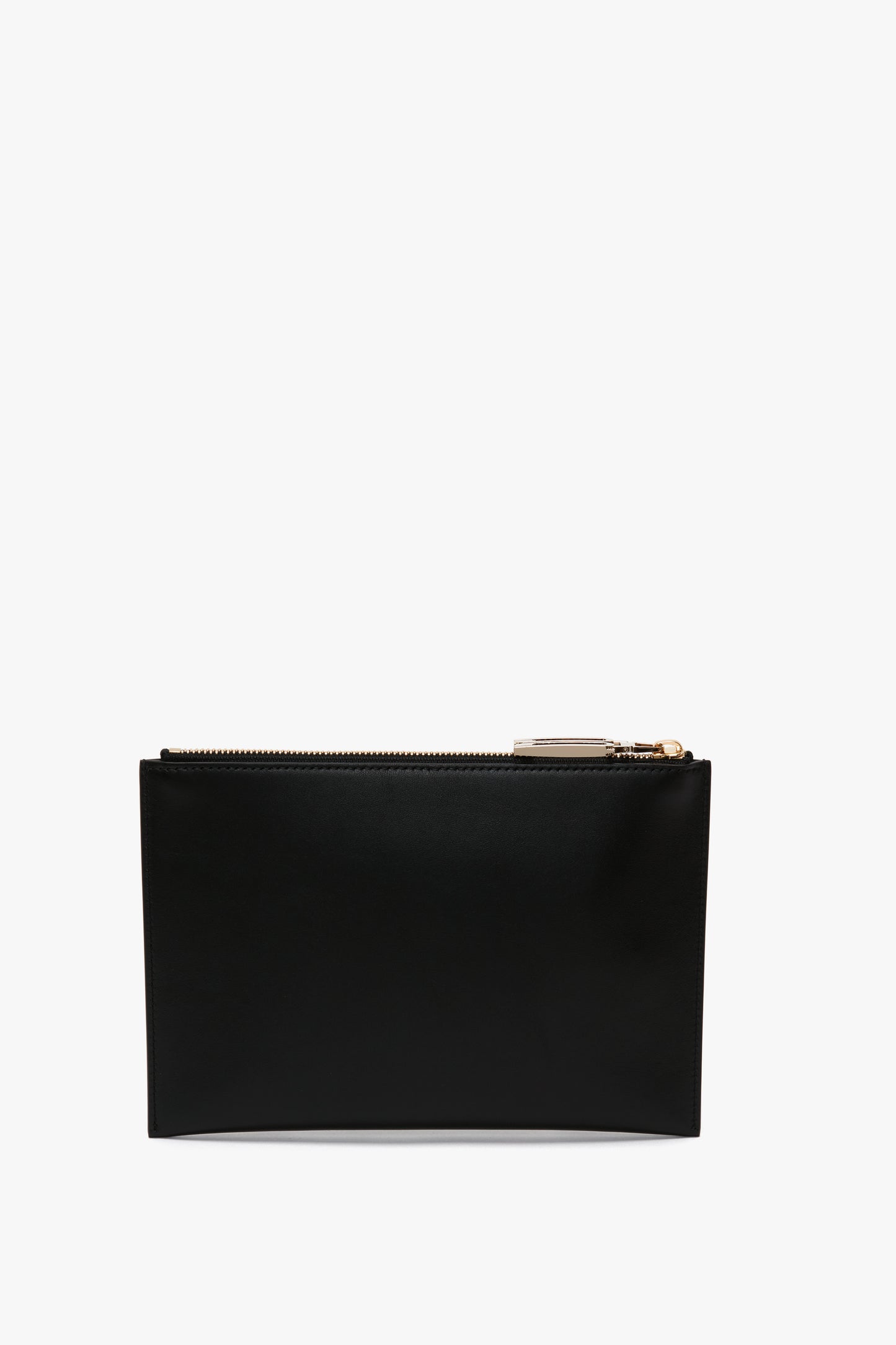 A black leather **B Frame Pochette Bag In Black Leather** crafted from smooth calf leather with a gold zipper pull by **Victoria Beckham**, perfect for your everyday essentials, set against a plain white background.