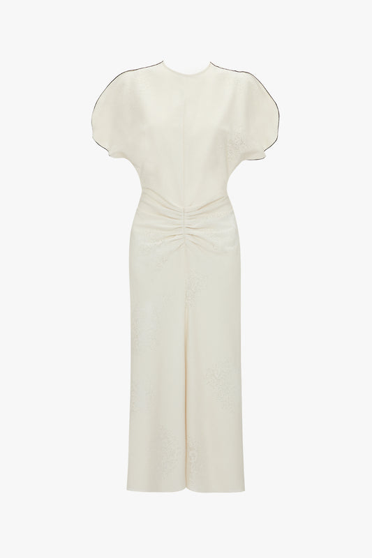 Elegant Gathered Waist Midi Dress In Cream with short puffy sleeves from Victoria Beckham on a plain background.