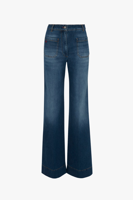 A pair of Victoria Beckham Alina Jean blue jeans in a dark vintage wash.