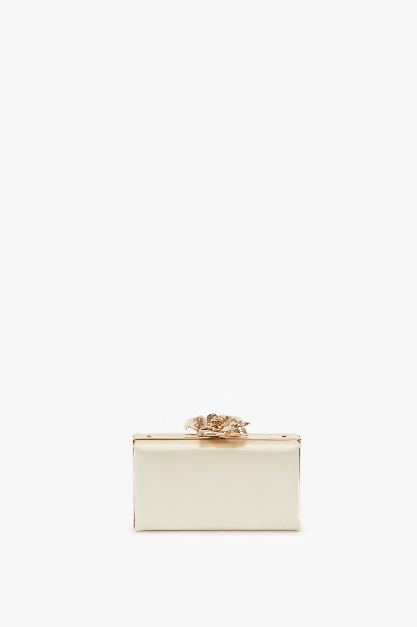 A rectangular, white Frame Flower Minaudiere Bag in Chamomile with a decorative gold handle and clasp, pictured against a plain white background. This elegant accessory could easily be from the refined collection of Victoria Beckham.