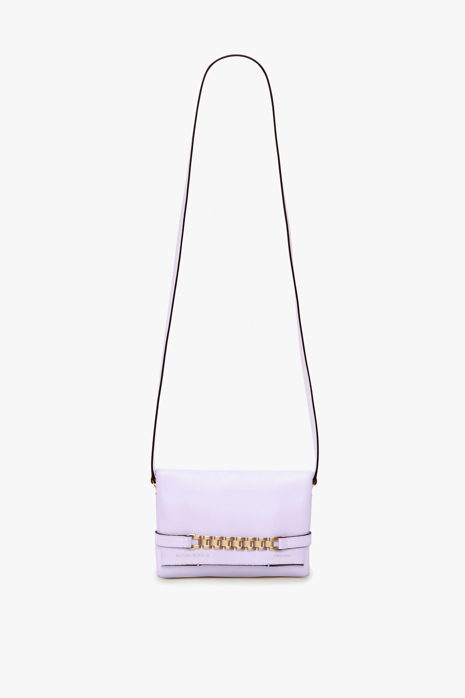 A Victoria Beckham Exclusive Mini Chain Pouch Bag With Long Strap In Lilac Leather with a long, thin detachable strap and gold chain detailing on the front.