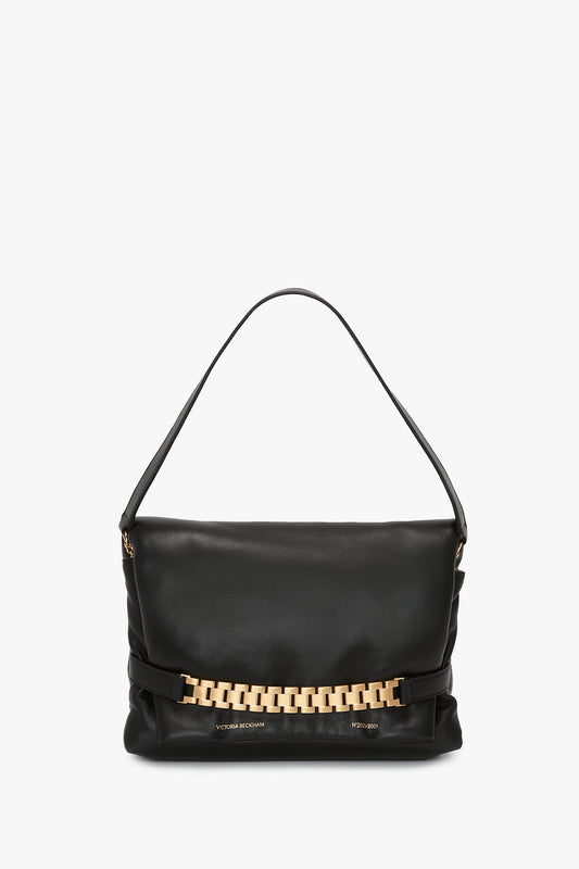 A Victoria Beckham Puffy Chain Pouch With Strap In Black Leather, displayed against a white background.