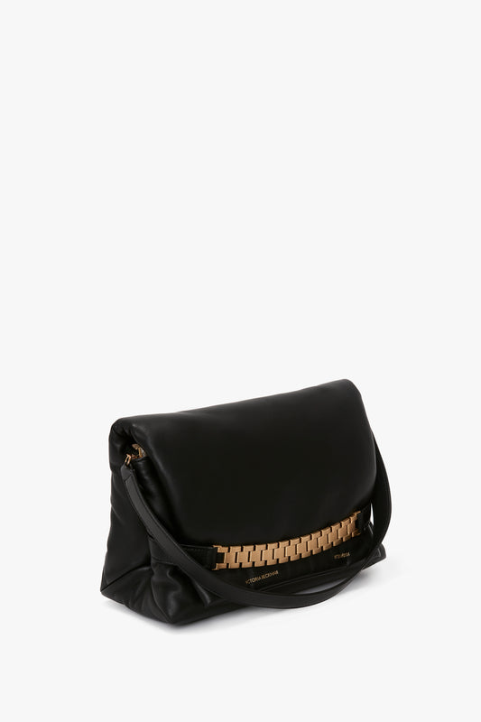 Puffy Chain Pouch With Strap In Black Leather by Victoria Beckham, displayed against a white background.