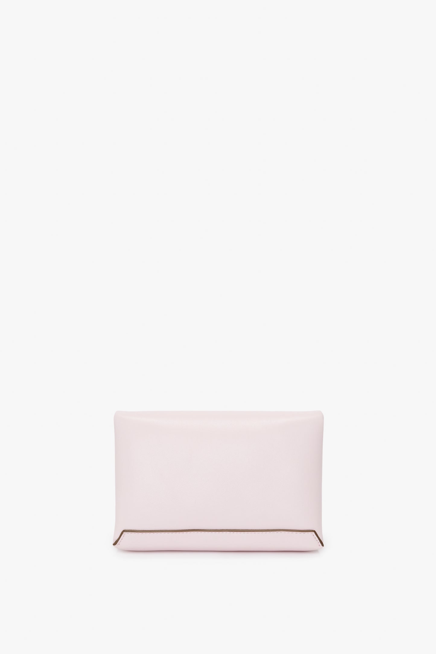 A rectangular, bubblegum pink *Exclusive Mini Chain Pouch Bag With Long Strap In Bubblegum Pink Leather* from Victoria Beckham with a detachable strap against a plain white background.