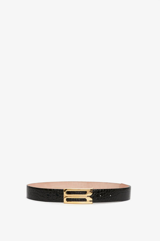 Jumbo Frame Belt in Black Croc-Effect Leather by Victoria Beckham, with a gold-tone buckle, centered on a white background.