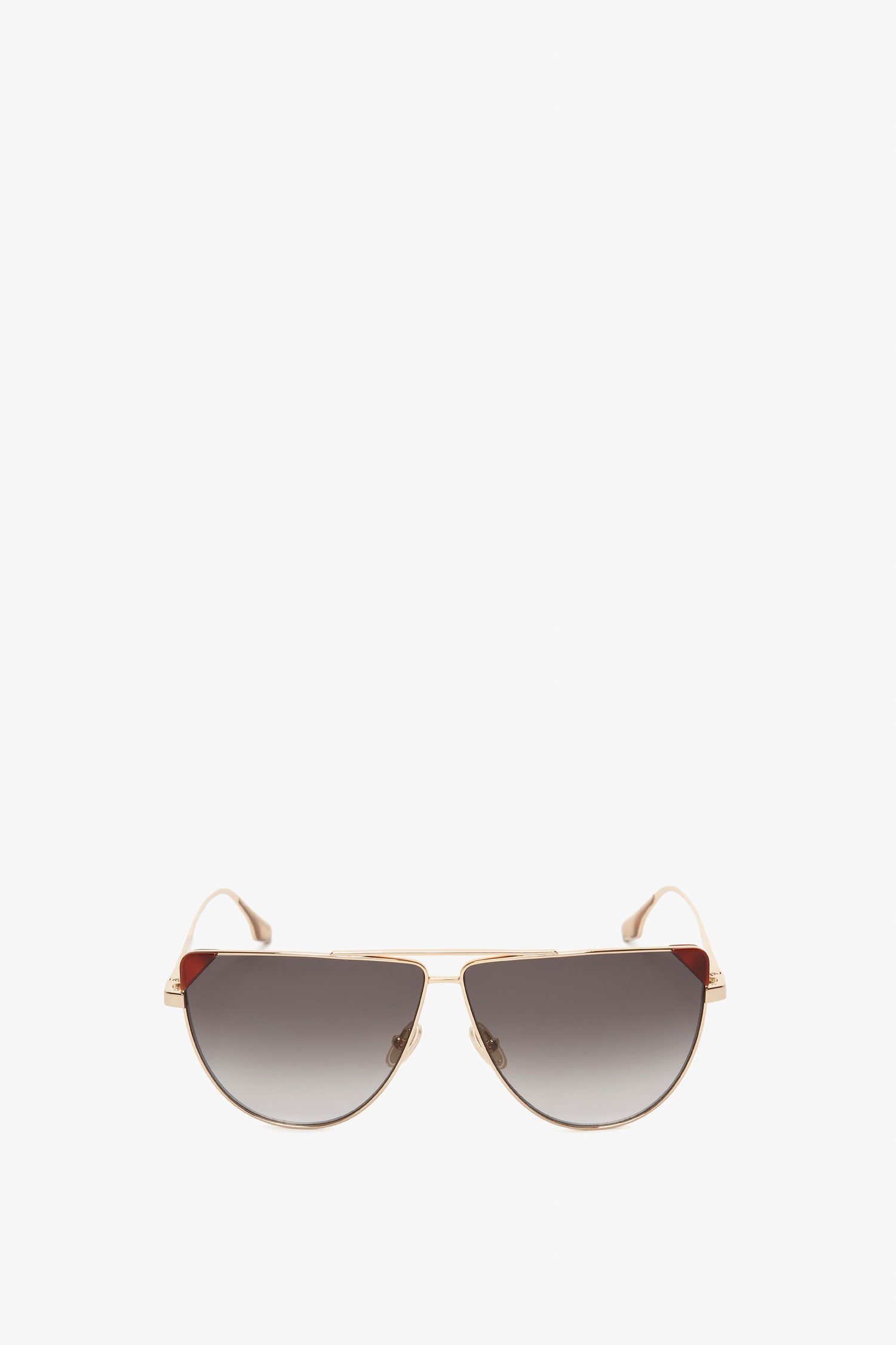 Victoria Beckham V-Line Aviator In Gold Blonde Havana sunglasses with gradient black lenses, shown on a white background.