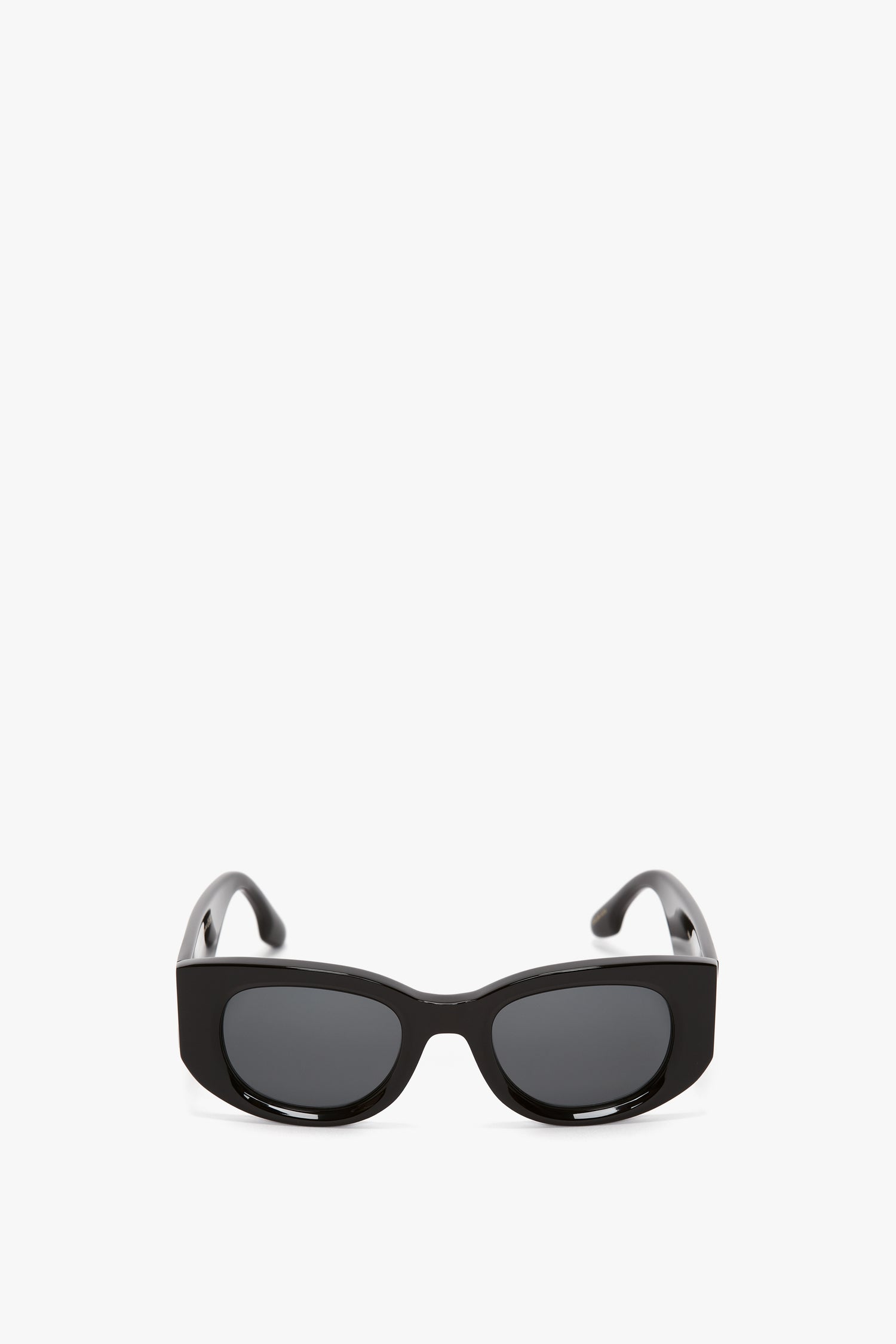 A pair of black rectangular Victoria Beckham Monogram Detail Sunglasses In Black with dark lenses, shown against a white background.