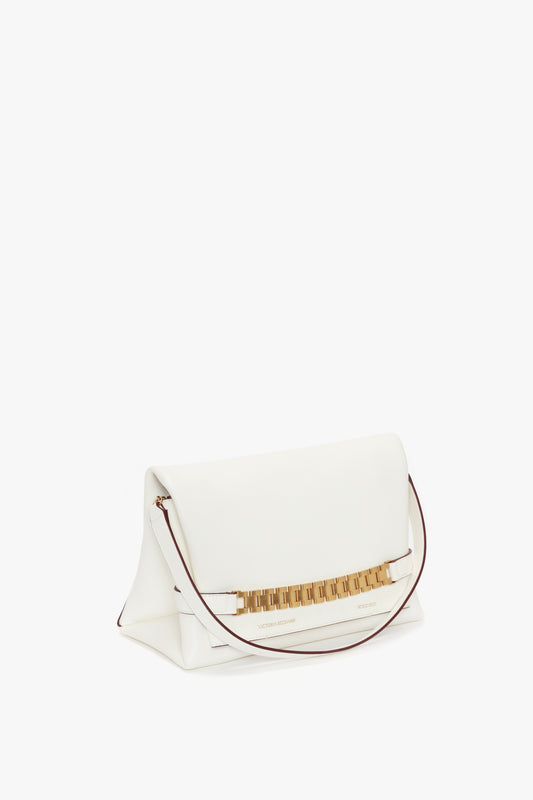 White Chain Pouch with Strap In White Leather by Victoria Beckham, displayed against a white background.