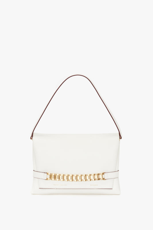 A white Nappa leather Chain Pouch with Strap In White Leather handbag by Victoria Beckham, displayed against a plain white background.