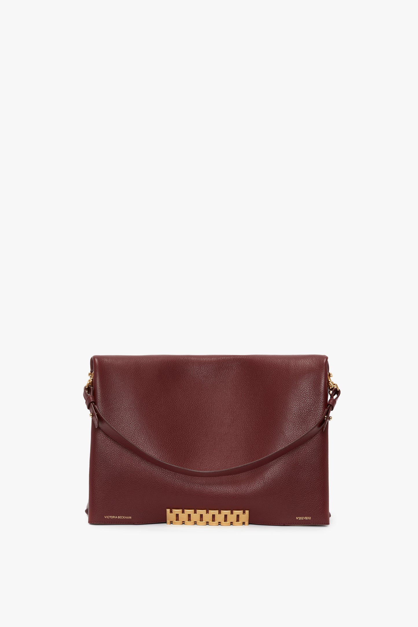 A Victoria Beckham Jumbo Chain Pouch Bag In Bordeaux Leather with a gold chain strap and decorative gold clasp, featuring a detachable strap for versatile wear.