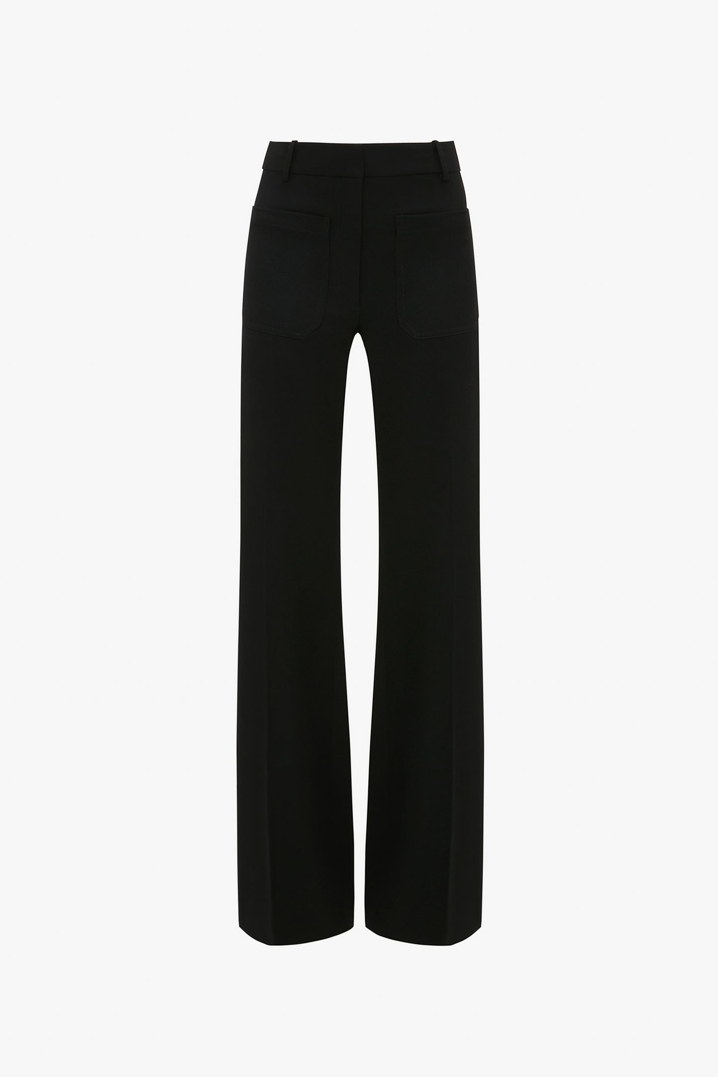 A pair of black trousers viewed from the back, featuring belt loops, two back pockets, and straight legs. Designed with subtle nods to 70s style references, these Victoria Beckham Alina Tailored Trouser In Black add a touch of retro sophistication.