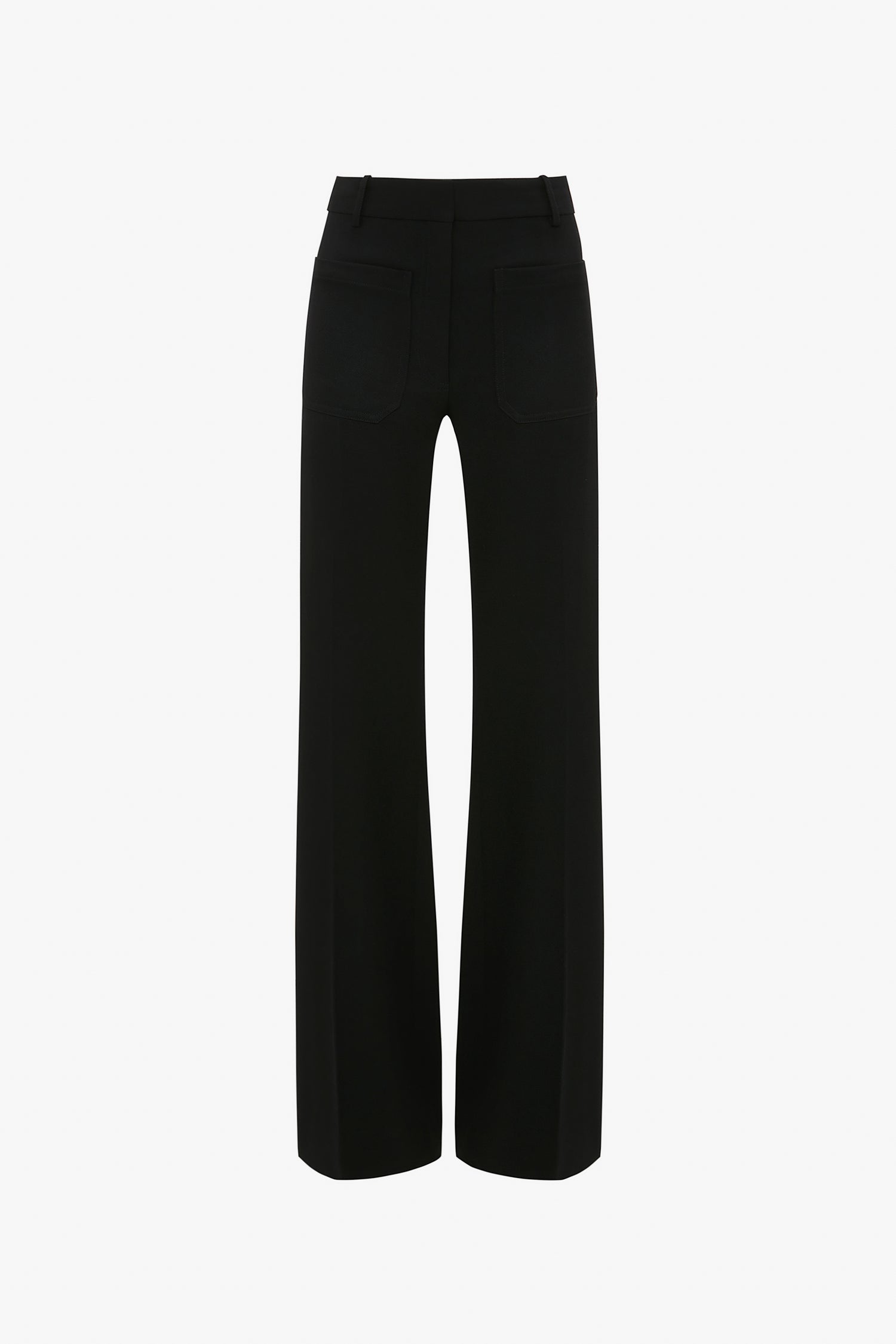 A pair of black trousers viewed from the back, featuring belt loops, two back pockets, and straight legs. Designed with subtle nods to 70s style references, these Victoria Beckham Alina Tailored Trouser In Black add a touch of retro sophistication.
