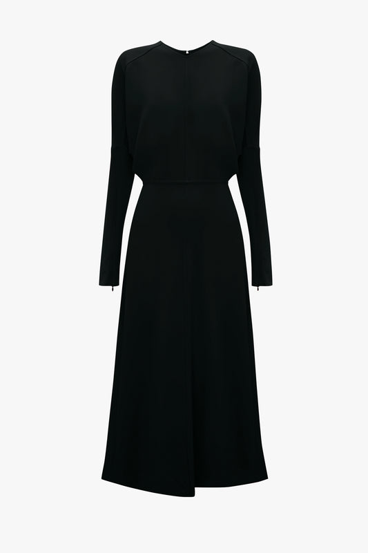 A Victoria Beckham Dolman Midi Dress in Black with a fitted bodice and a flared skirt, displayed on a white background alongside pointy toe stiletto sandals.