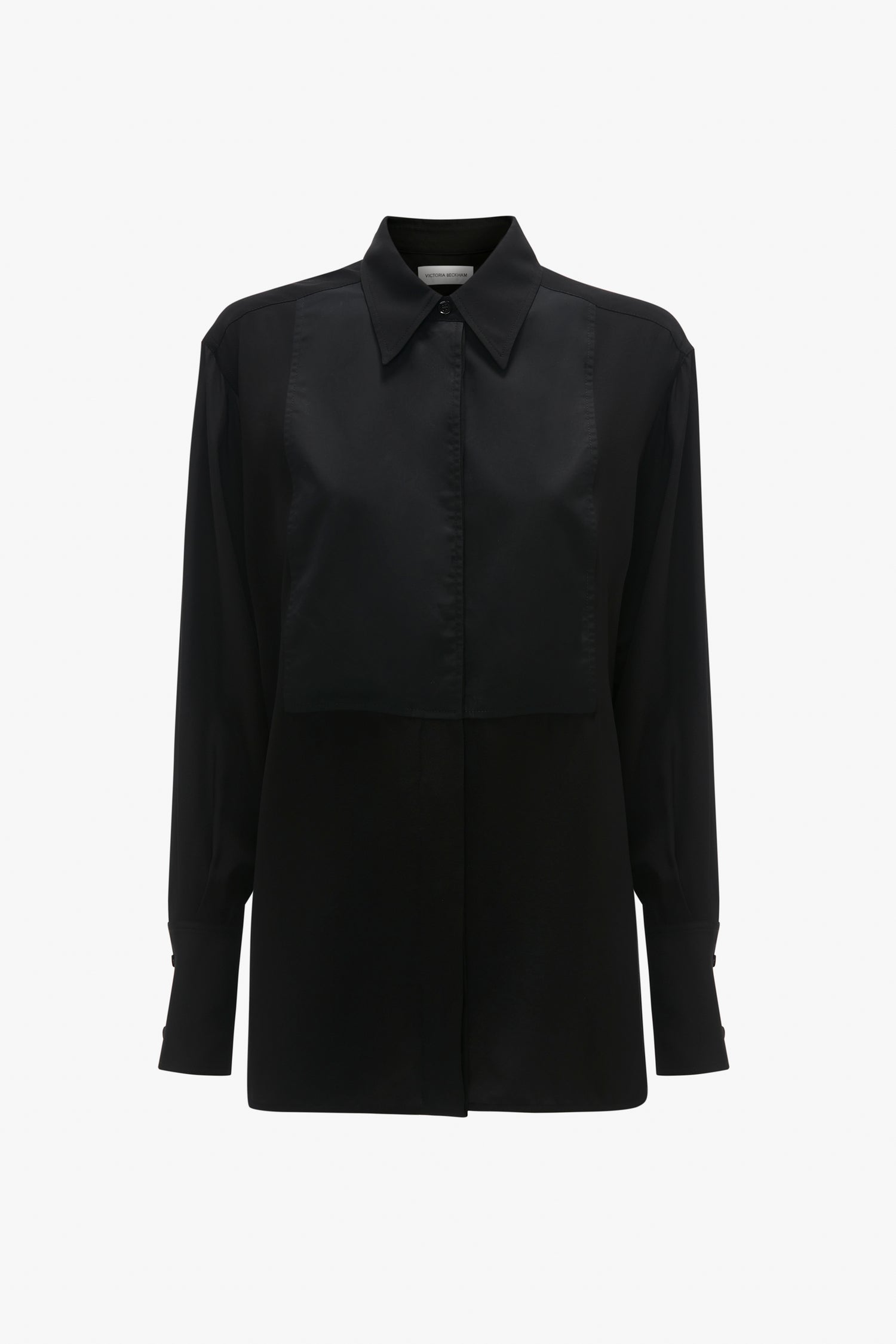 A Victoria Beckham black satin blouse with long sleeves and a concealed button-front closure, isolated on a white background.