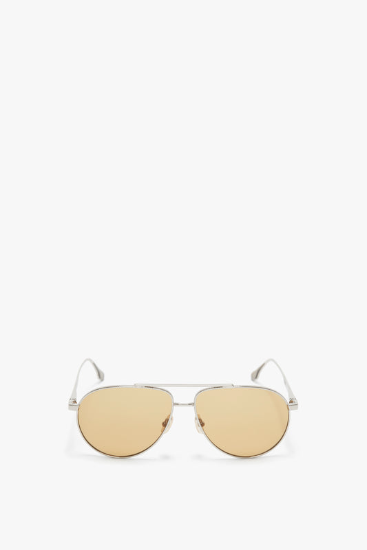 A pair of Victoria Beckham V Metal Pilot Sunglasses In Silver-Brown, positioned on a white background.