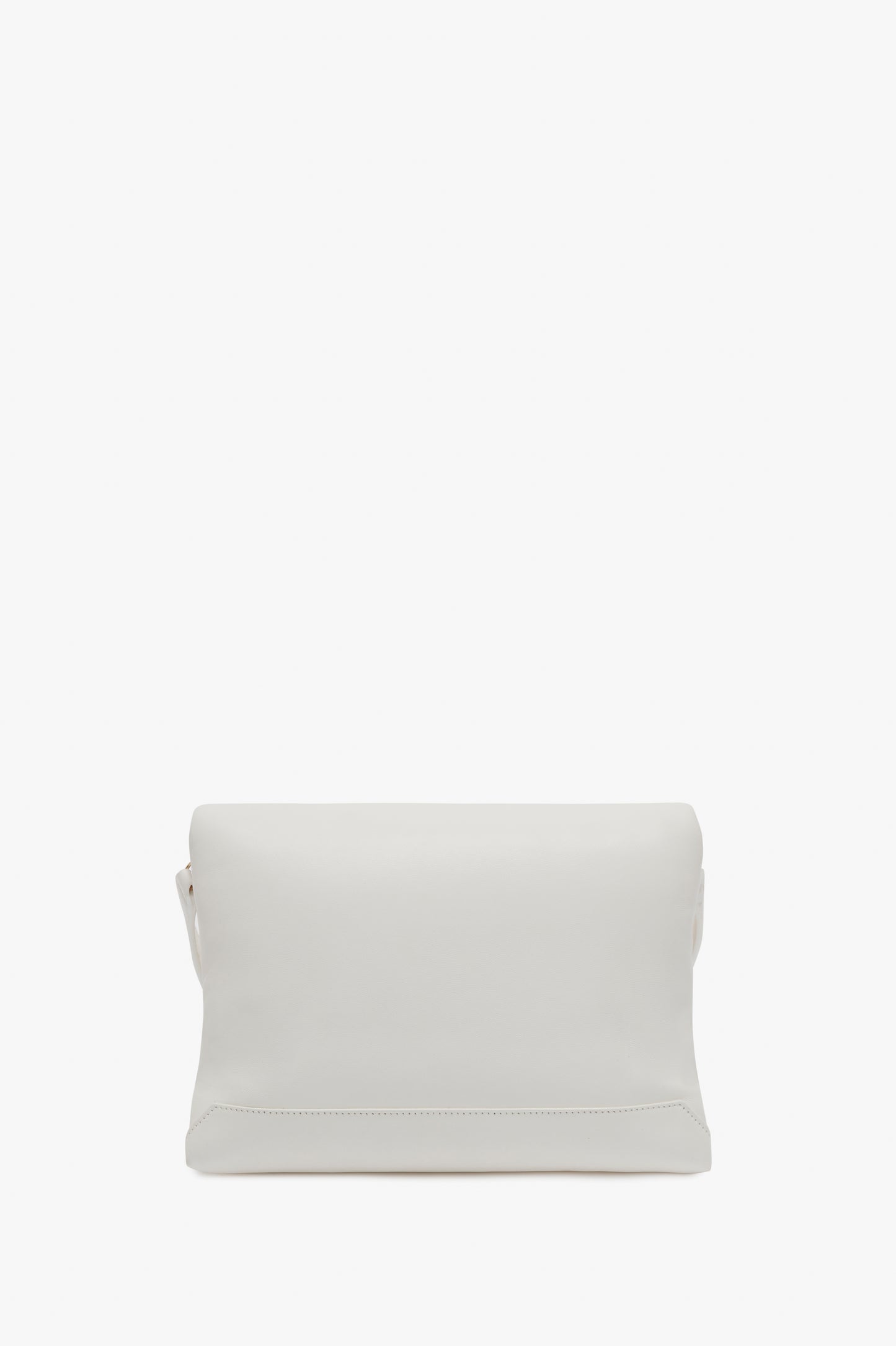 A plain white Victoria Beckham Puffy Chain Pouch With Strap In White Leather with a simple design and gold chain detail, placed against a white background.