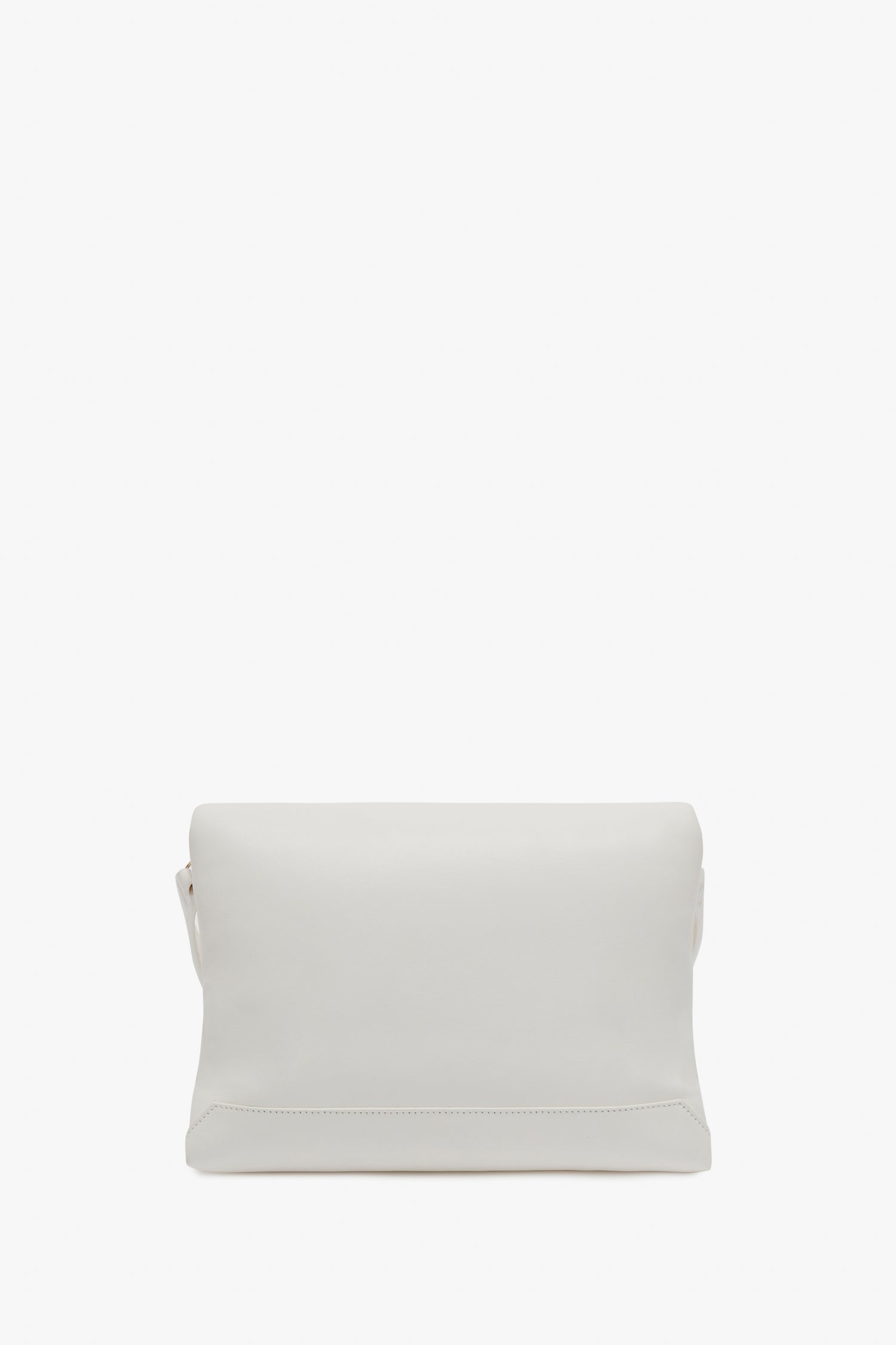 A plain white Victoria Beckham Puffy Chain Pouch With Strap In White Leather with a simple design and gold chain detail, placed against a white background.