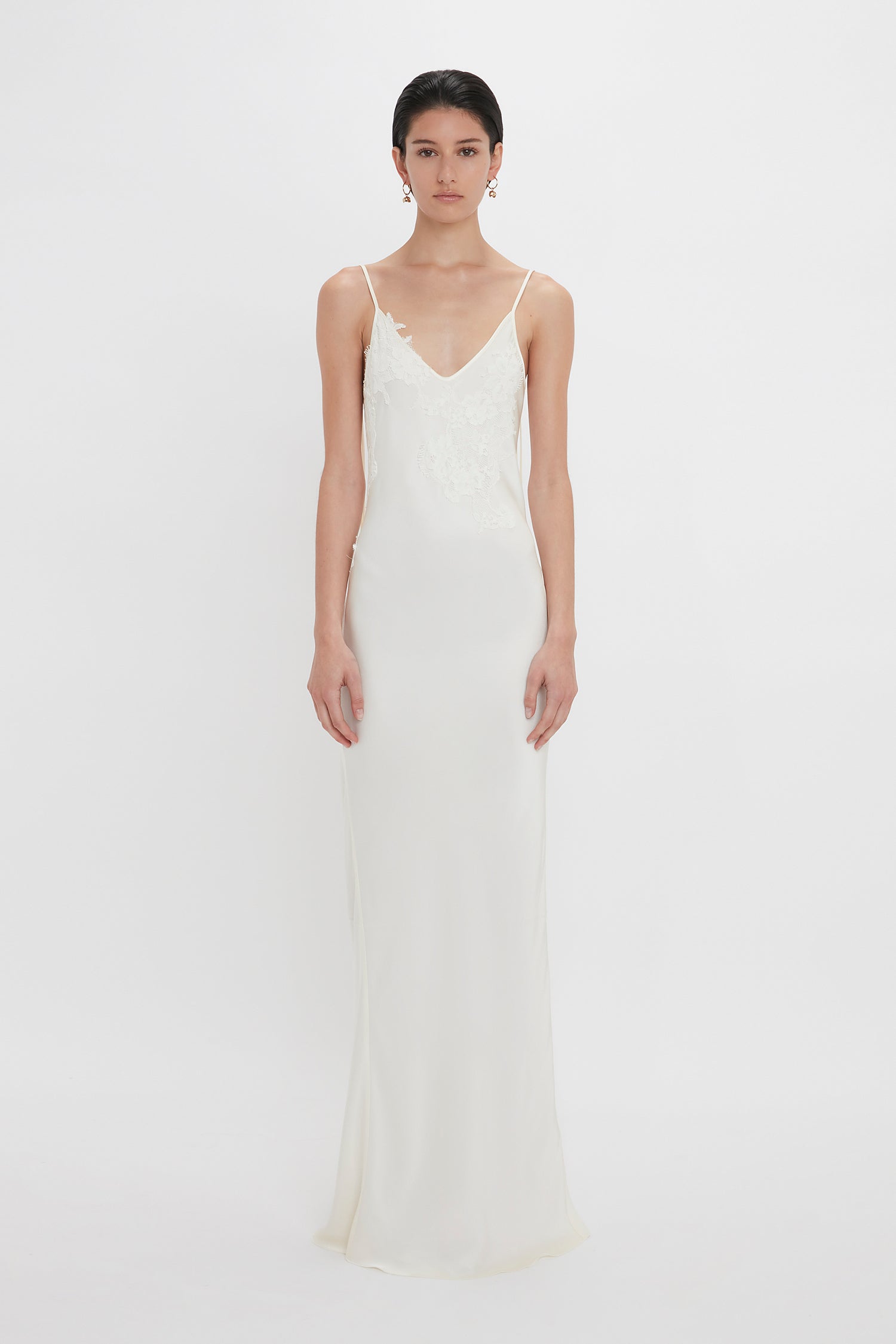 victoria beckham white silk dress Victoria Beckham's bridal white slip dress nails a 2025 wedding dress trend you can shop on the high street