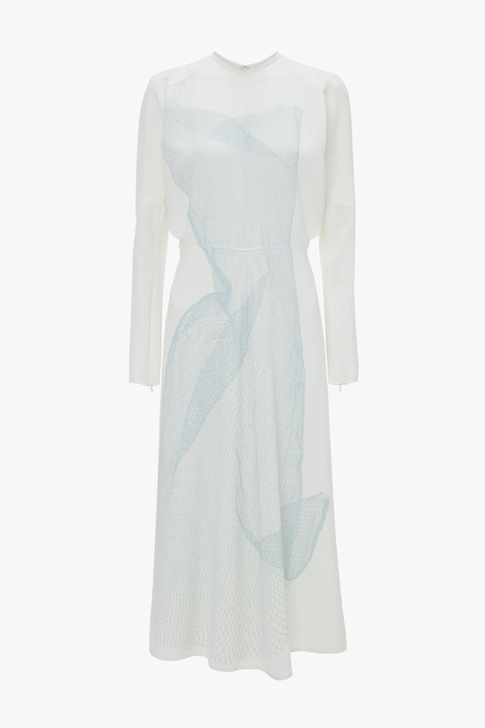 A Victoria Beckham long-sleeve white dress with a sheer blue diagonal overlay in fluid cady fabric, displayed on a plain background.
