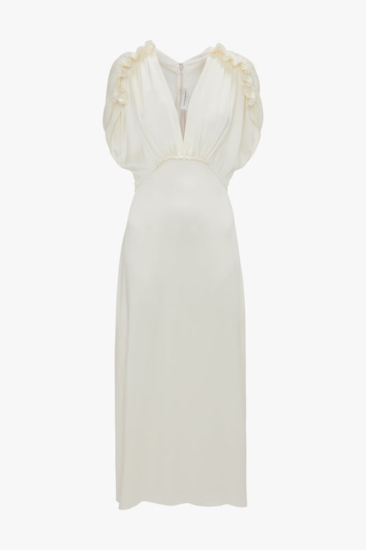 Exclusive V-Neck Ruffle Midi Dress In Ivory with cap sleeves featuring delicate ruffle details and a slightly gathered waist, reminiscent of Victoria Beckham's sophisticated style.