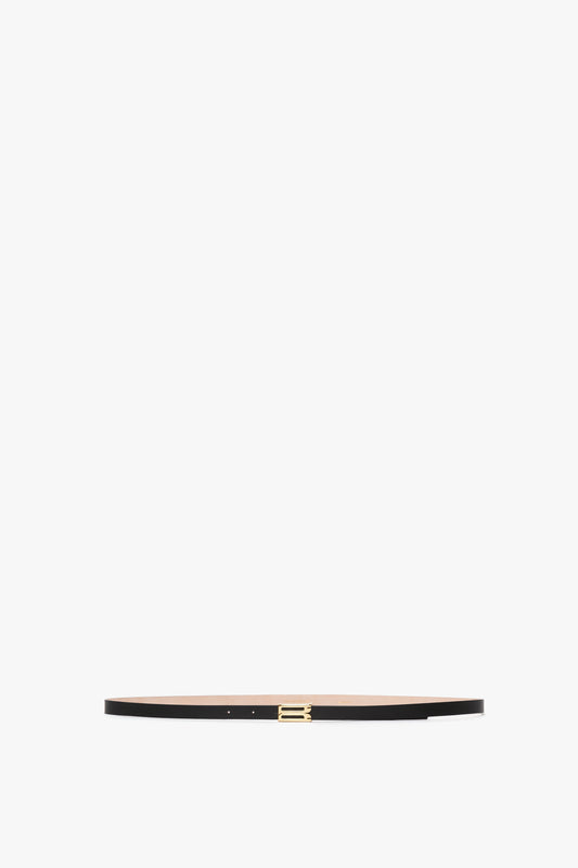 Exclusive Victoria Beckham Micro Frame Belt in Black Leather with a gold buckle, centered on a white background.