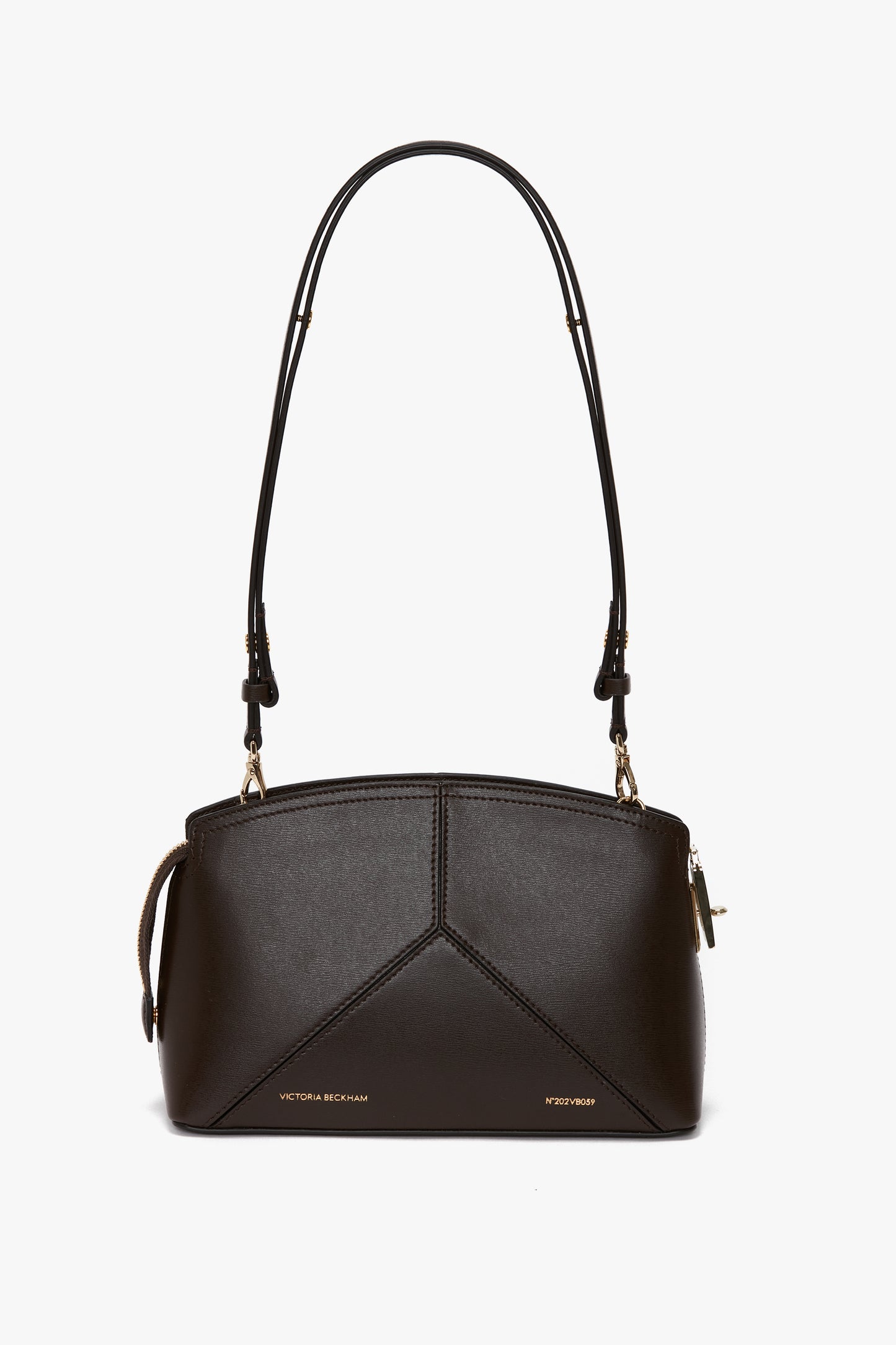 An Exclusive Victoria Crossbody Bag In Brown Leather, featuring an adjustable strap and labeled with "Victoria Beckham" and "PSFW 5007".