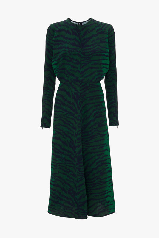 A Victoria Beckham Dolman Midi Dress In Green-Navy Tiger Print with long sleeves and a mid-length skirt, displayed on a white background.