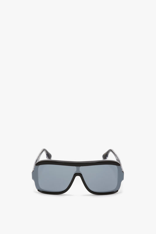 A pair of Victoria Beckham Layered Mask Sunglasses In Black-Silver-Mirror with dark lenses and acetate temples against a white background.