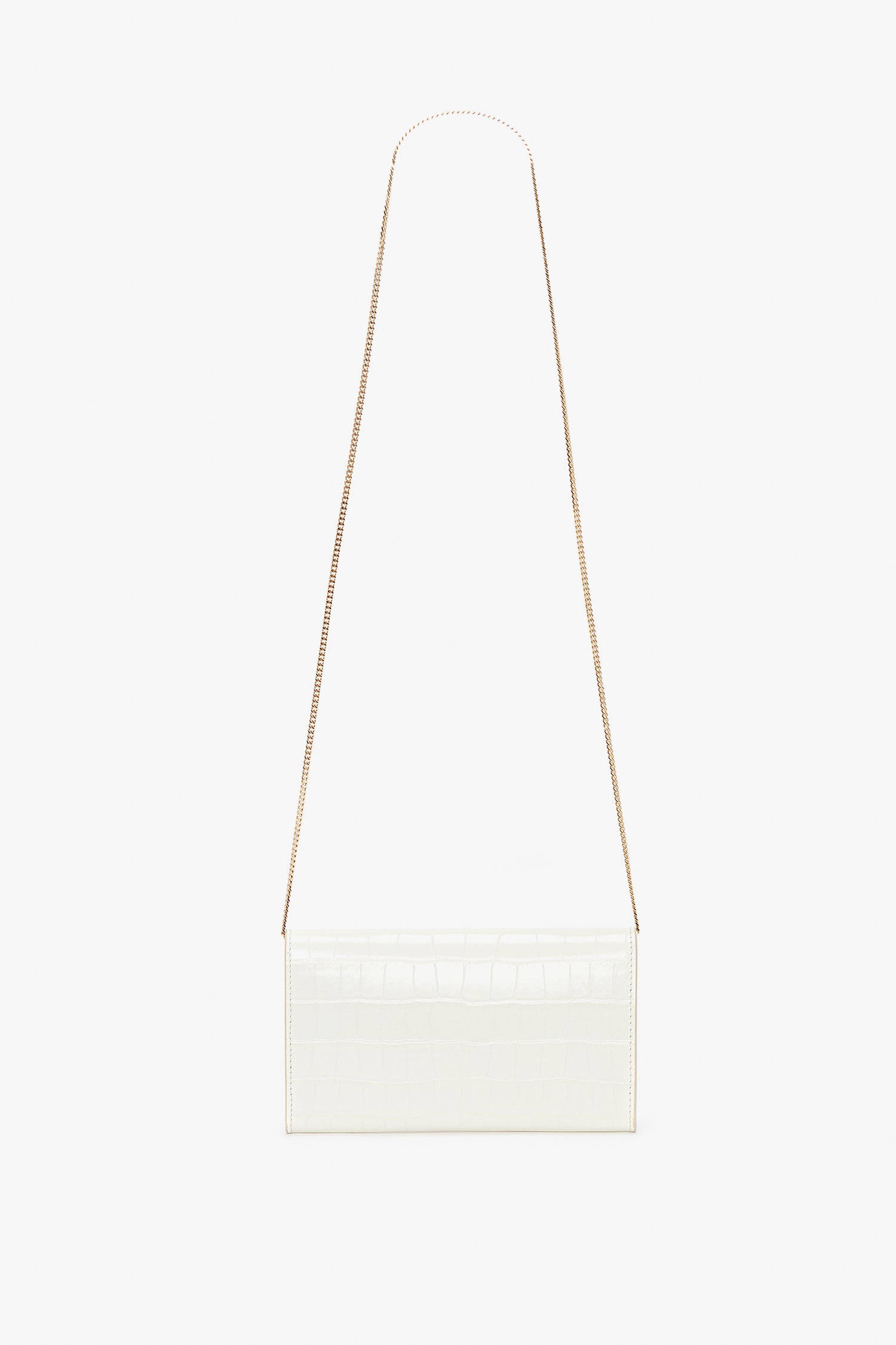 Victoria Beckham Exclusive Wallet On Chain In Ivory Croc-Effect Leather with a thin gold chain strap against a white background.