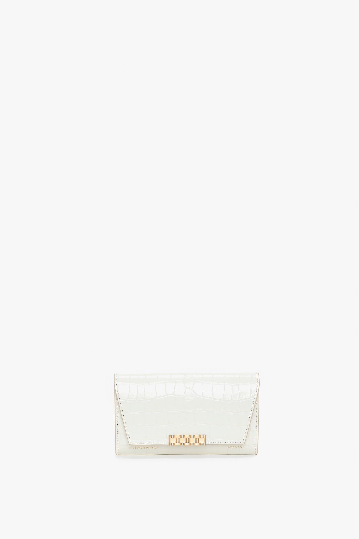 A Victoria Beckham Exclusive Wallet On Chain In Ivory Croc-Effect Leather with a gold clasp, set against a plain white background.