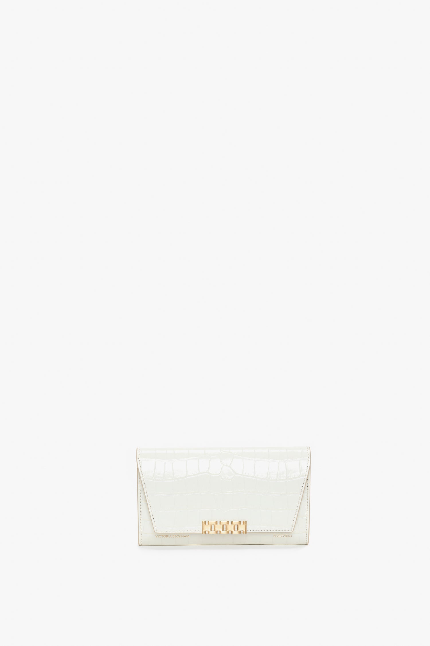 A Victoria Beckham Exclusive Wallet On Chain In Ivory Croc-Effect Leather with a gold clasp, set against a plain white background.