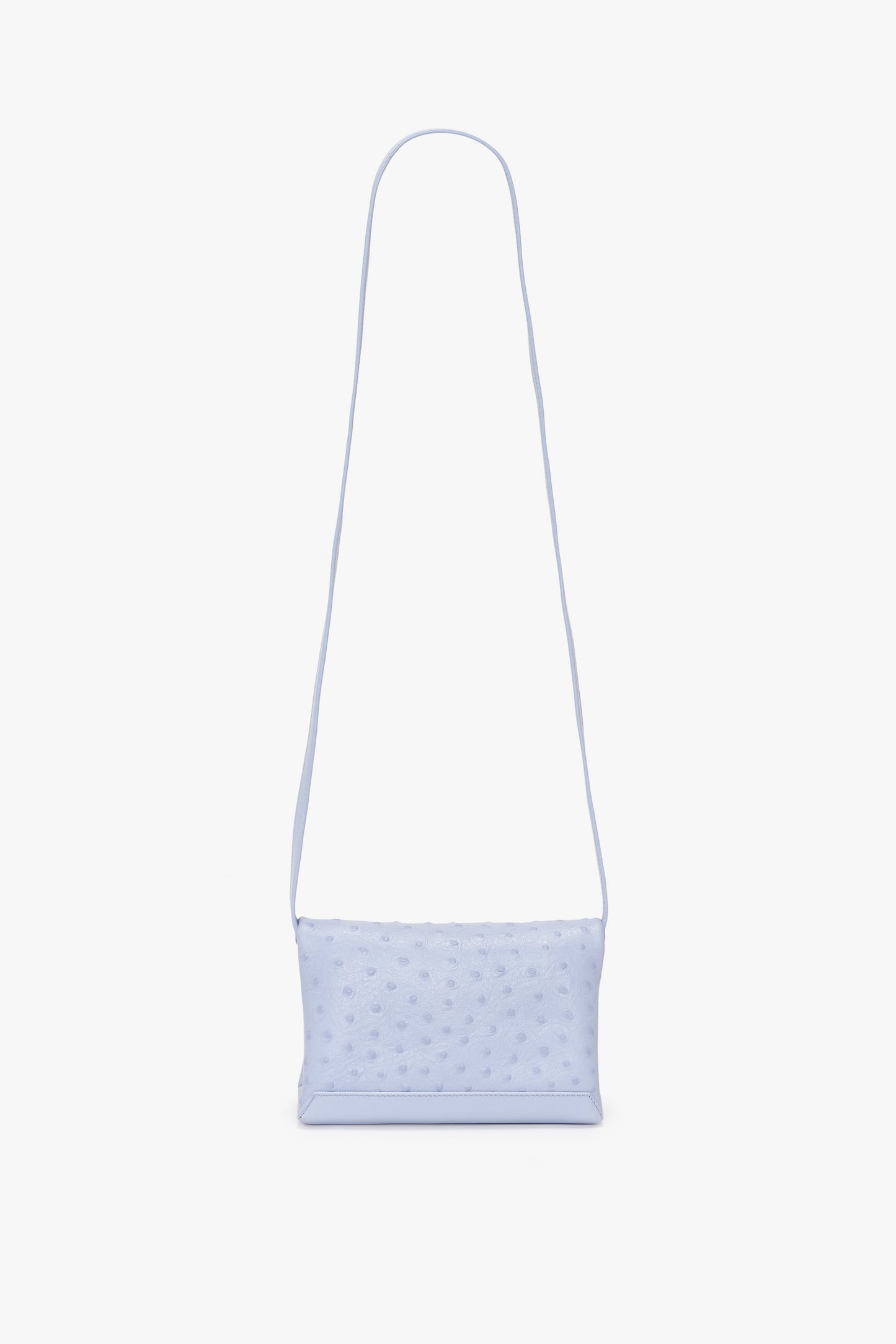 Victoria Beckham Mini Chain Pouch With Long Strap In Frost Ostrich-Effect Leather, made from embossed ostrich-effect leather, featuring a long strap, a textured surface, and a gold-tone chain detail.