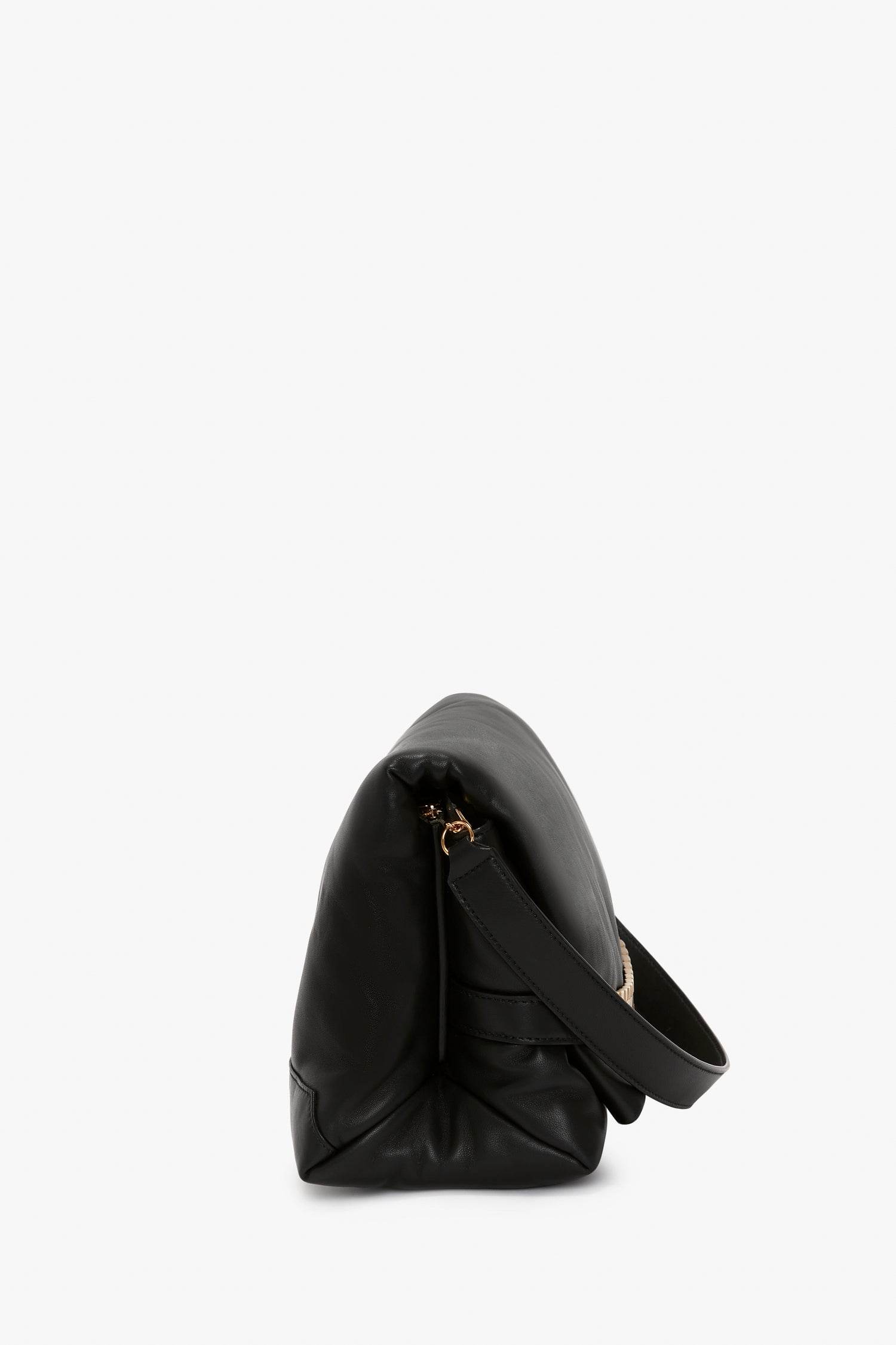 A Victoria Beckham Puffy Chain Pouch With Strap in black nappa leather with a zip-top, slightly slouched and resting on a white background.